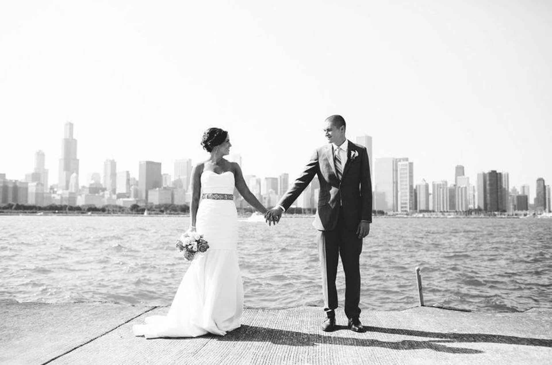 alumni-Halicki-Spirakes-married-couple-chicago-skyline-background